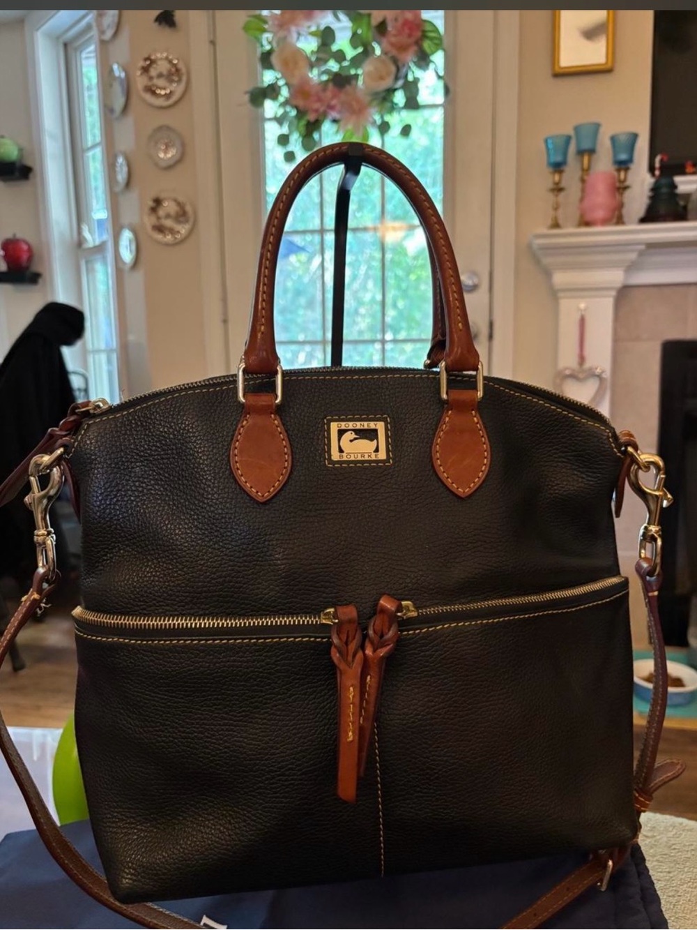 Dooney & Bourke Black Leather Satchel with Brown Trim and Brass Hardware